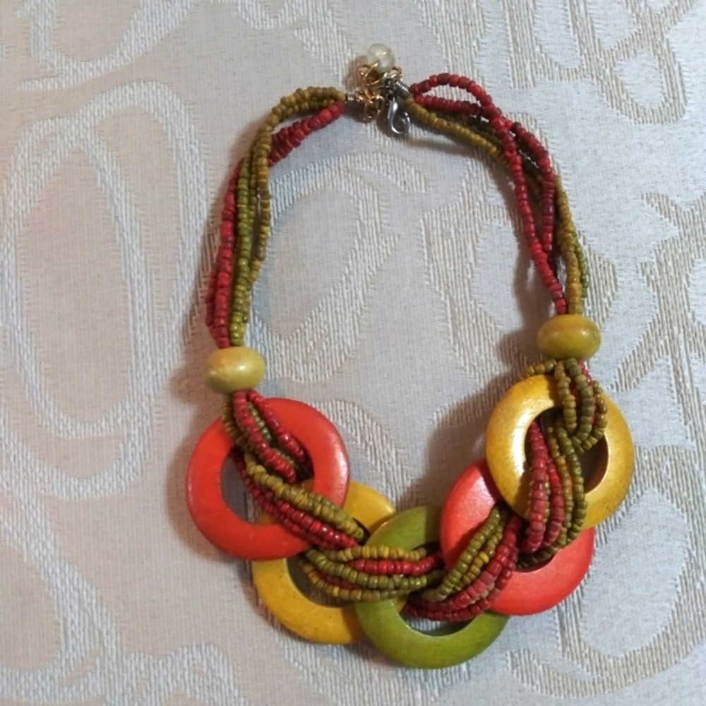 A irresistible green gold and orange necklace